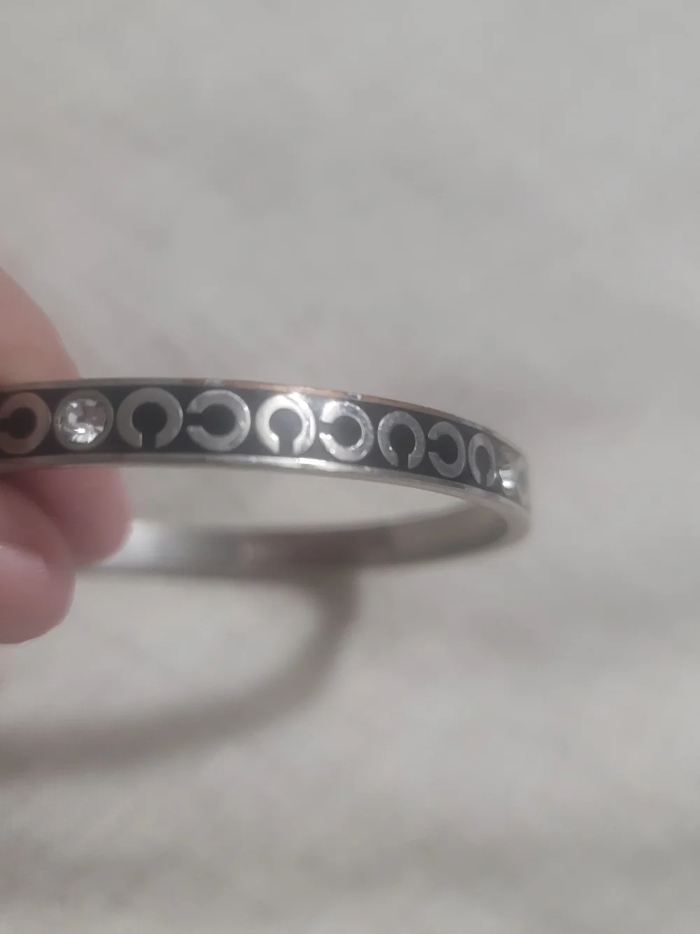 Coach Silver-Tone Logo Bangle with Black Inlay and Crystal